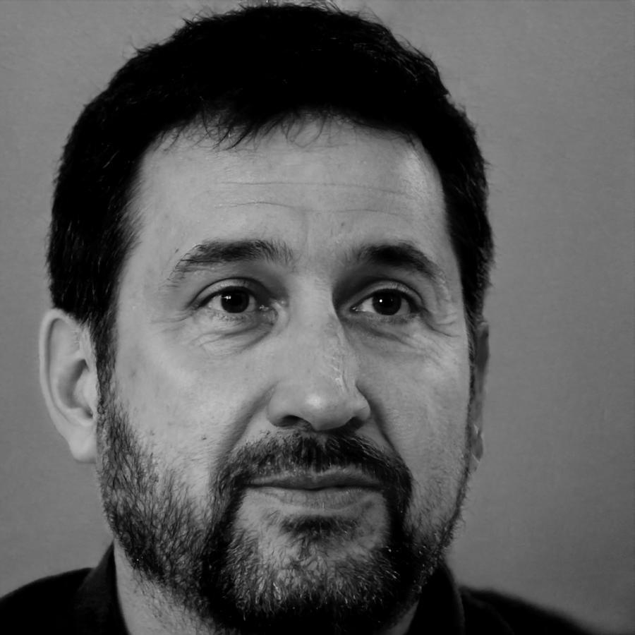 Dr. Jasper reviewing financial documents