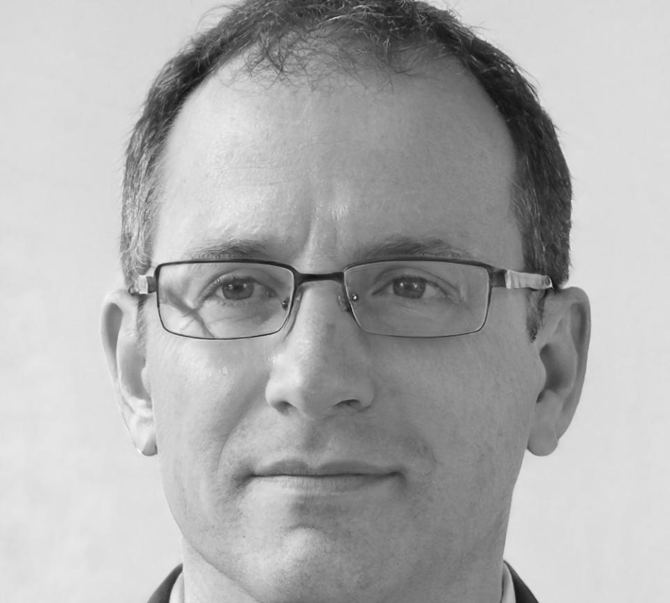 Retail business owner discussing budget management success